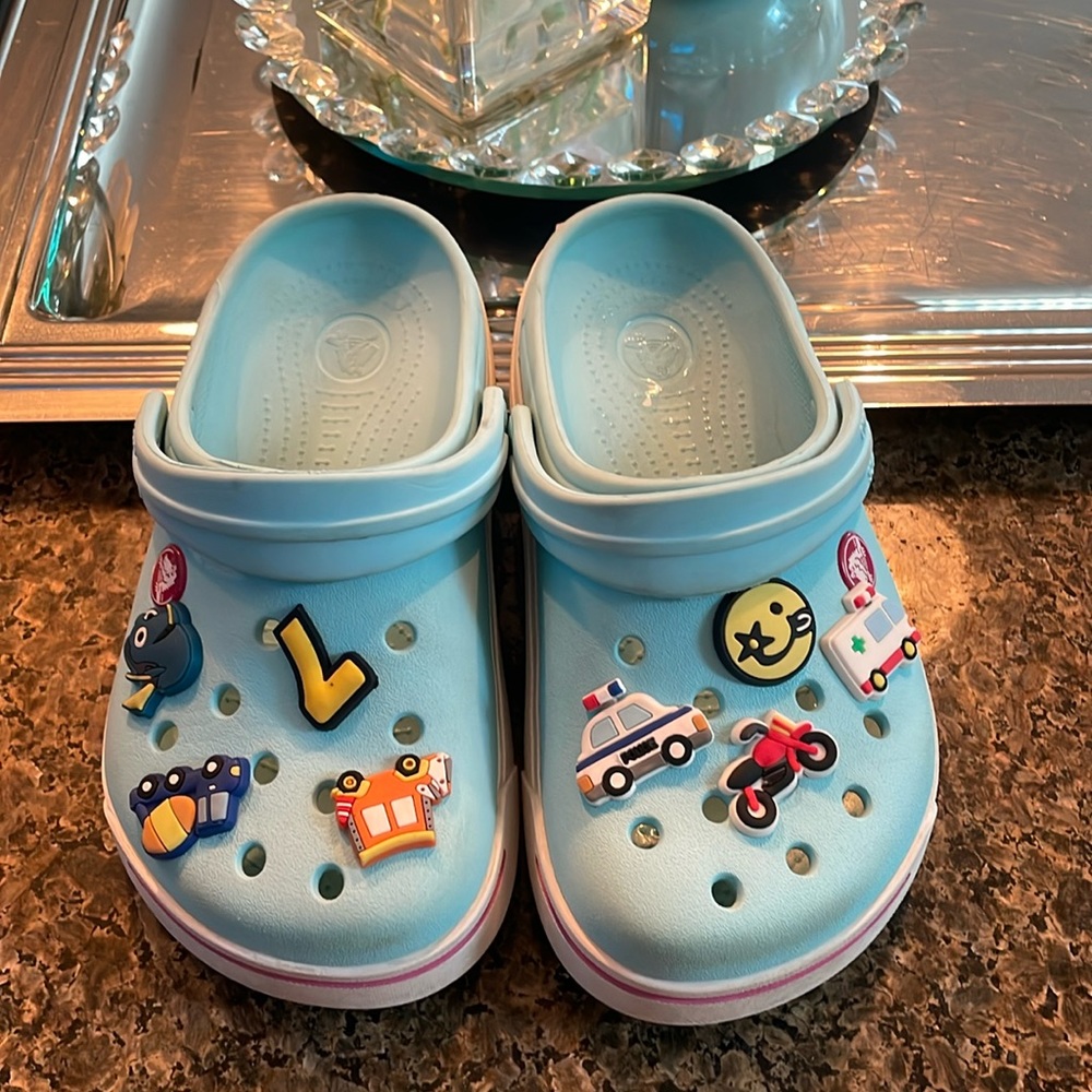 Kids Crocs size J1. Beautiful blue/teal color